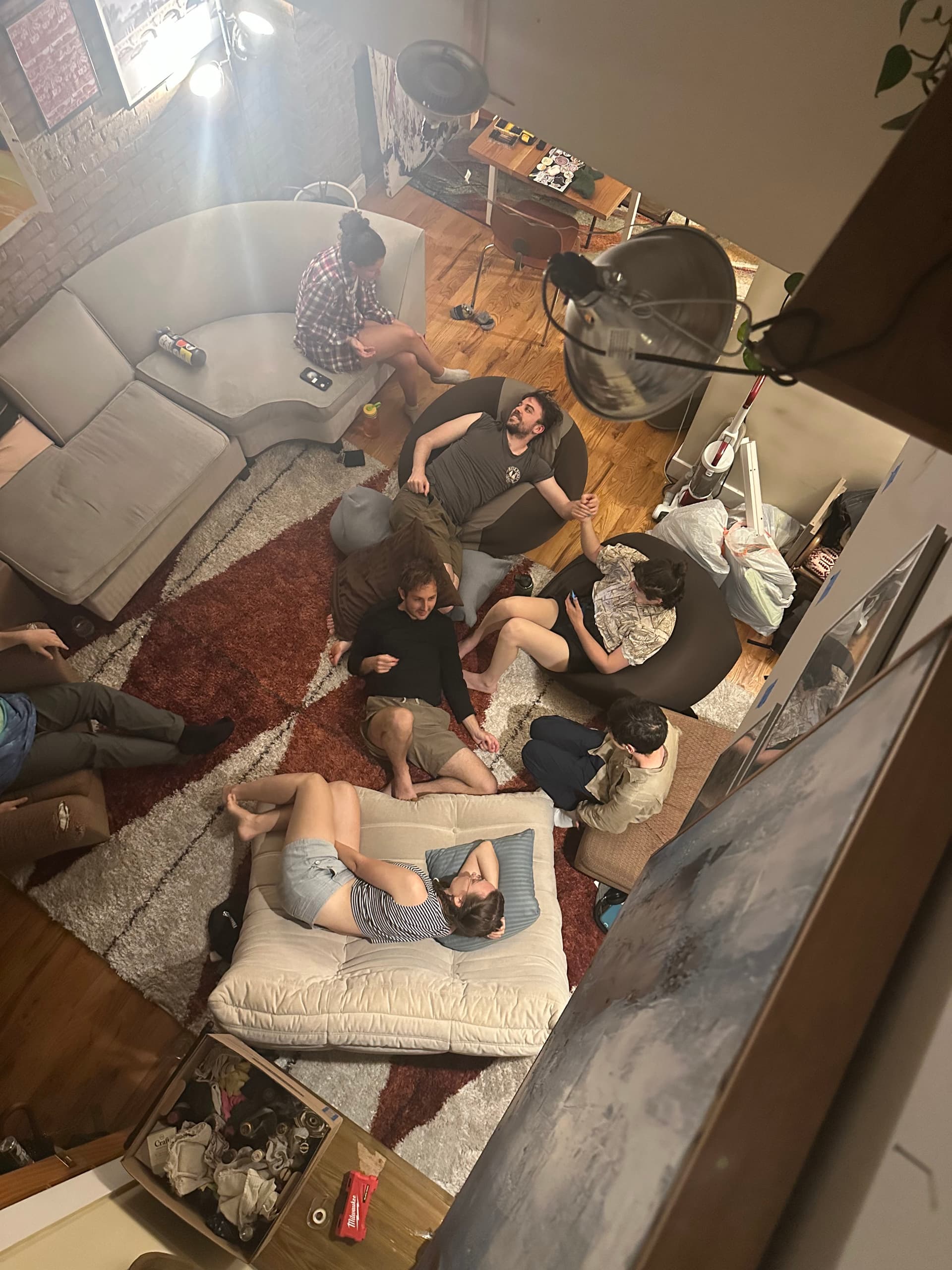 The living room from above — everyone sprawled out